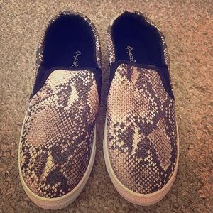 Snakeskin slip ons